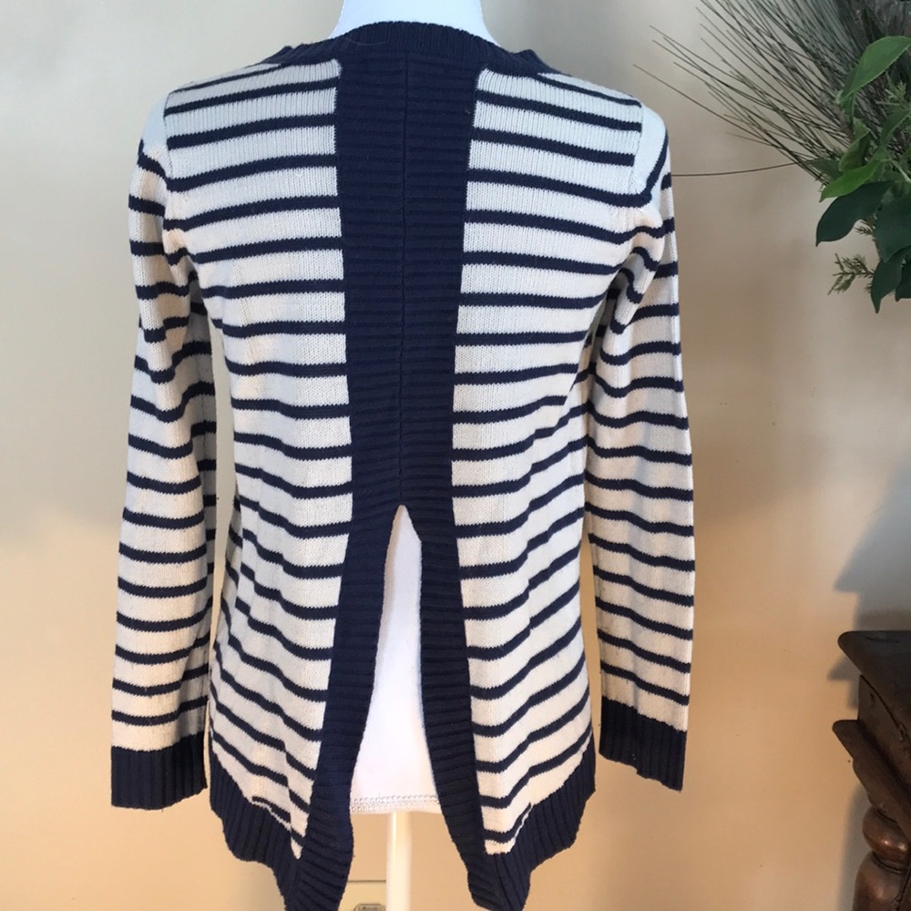 Striped navy and cream sweater with open back
